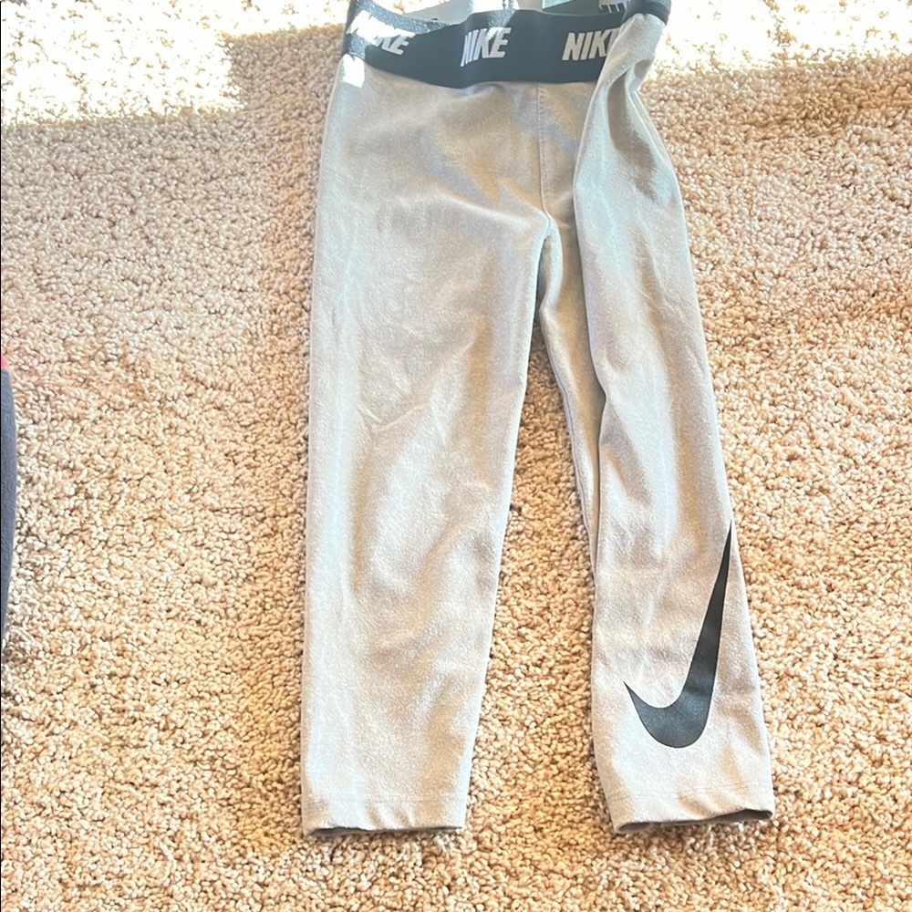 Nike Gray and Black Leggings with Iconic Swoosh